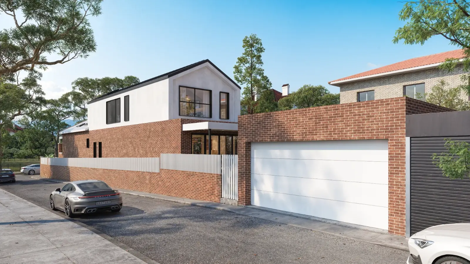 Meridian in Leichhardt from the rear lane: the new white second storey above the red-brick garage and fence