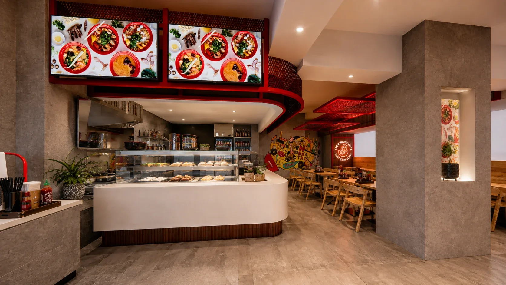 No. 1 Malatang in Kensington: a curved white counter under menu screens and a red mesh ceiling, with timber tables beyond