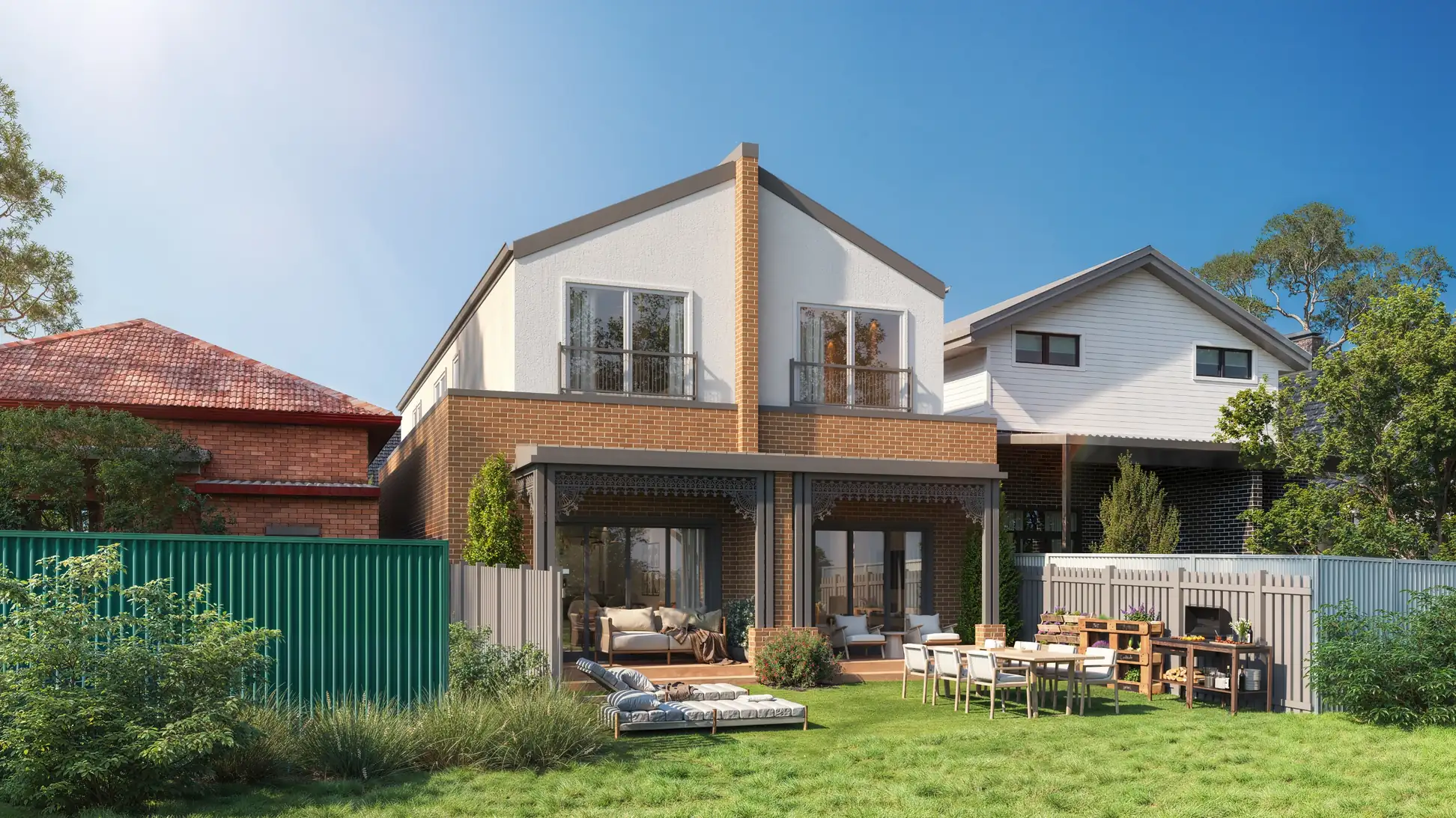 The rear of the Rosemere duplex: both homes opening to a lawn, a deck and an outdoor dining table, Tempe