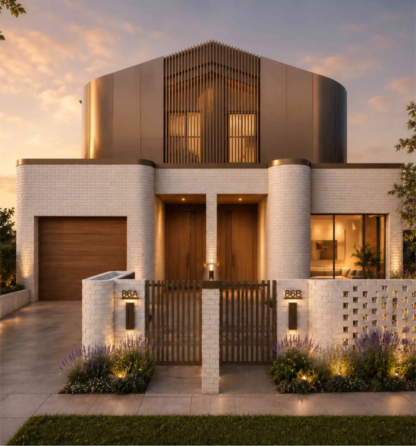 The Duet in Marrickville at sunset: two white-brick homes under a curved metal-clad upper floor, with lit entries and planting